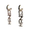 Chanel “Chanel” Letter Drop Earrings Black/White Enamel Light Gold Hardware